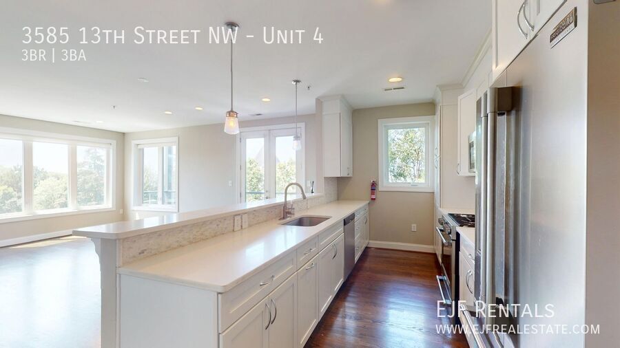 Stunning Three Bedroom Penthouse Condo W/Three Private Outdoor Spaces & Parking Included! property image